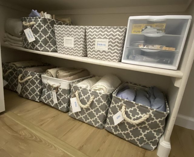 Baskets hallway closet on thebusywoman.com